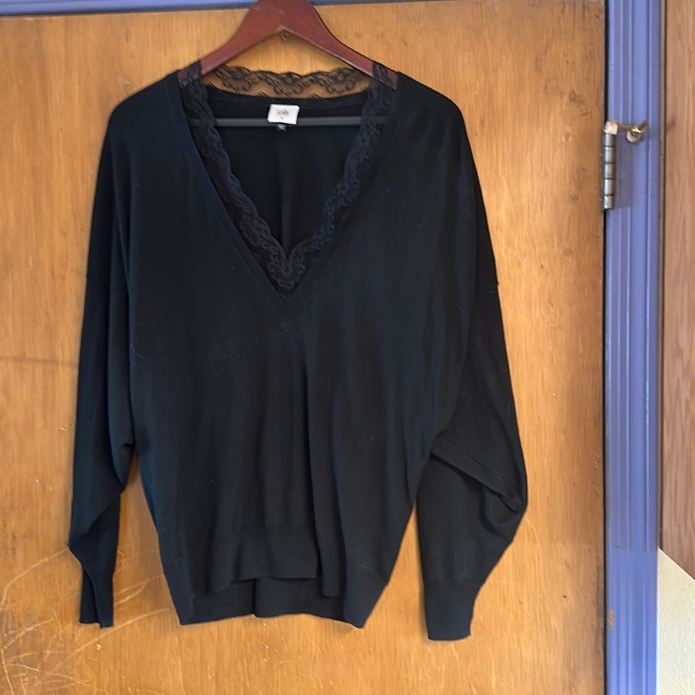 Cabi, lace-lined v-neck light sweater.